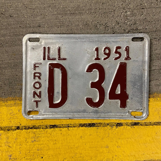 Photo of a 1951 Illinois Truck License Plate Auto Tag Garage Decor Vintage Low Number Two Digit D 34 with original patina