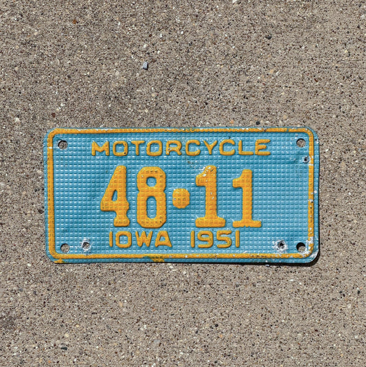 Photo of a 1951 Iowa Motorcycle License Plate Auto Tag Garage Decor Vintage Waffle Style Low Number Two Digit Iowa County 48 11 with original patina