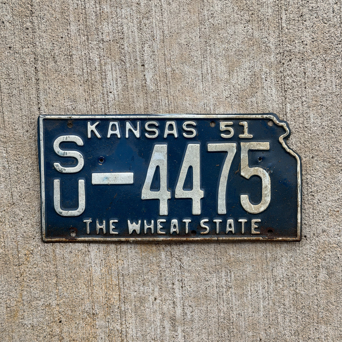 Photo of a 1951 Kansas License Plate Auto Tag Garage Decor Vintage State Shape SU 4475 with original patina