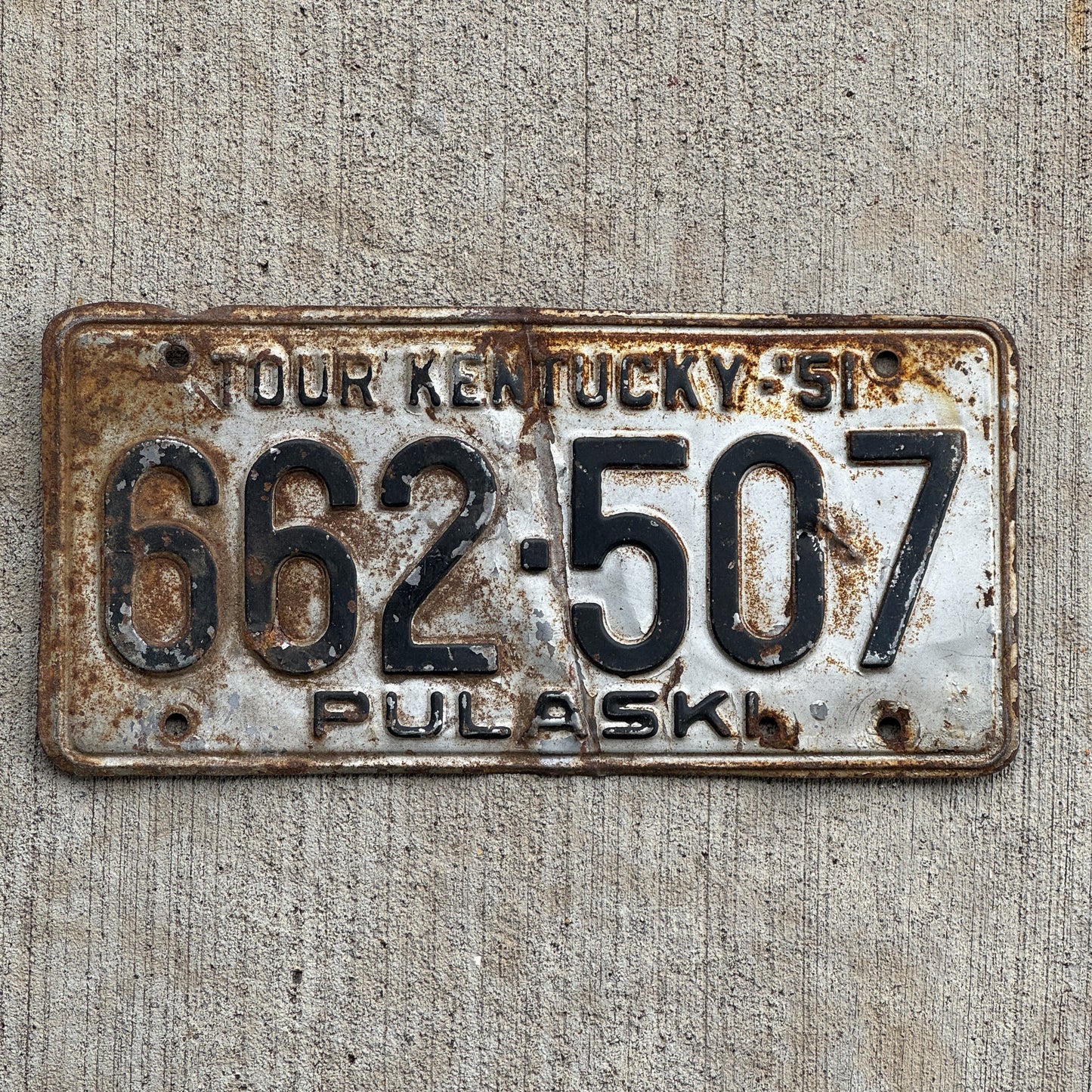 Photo of a 1951 Kentucky License Plate Auto Tag Garage Decor Vintage 662 507 with original patina