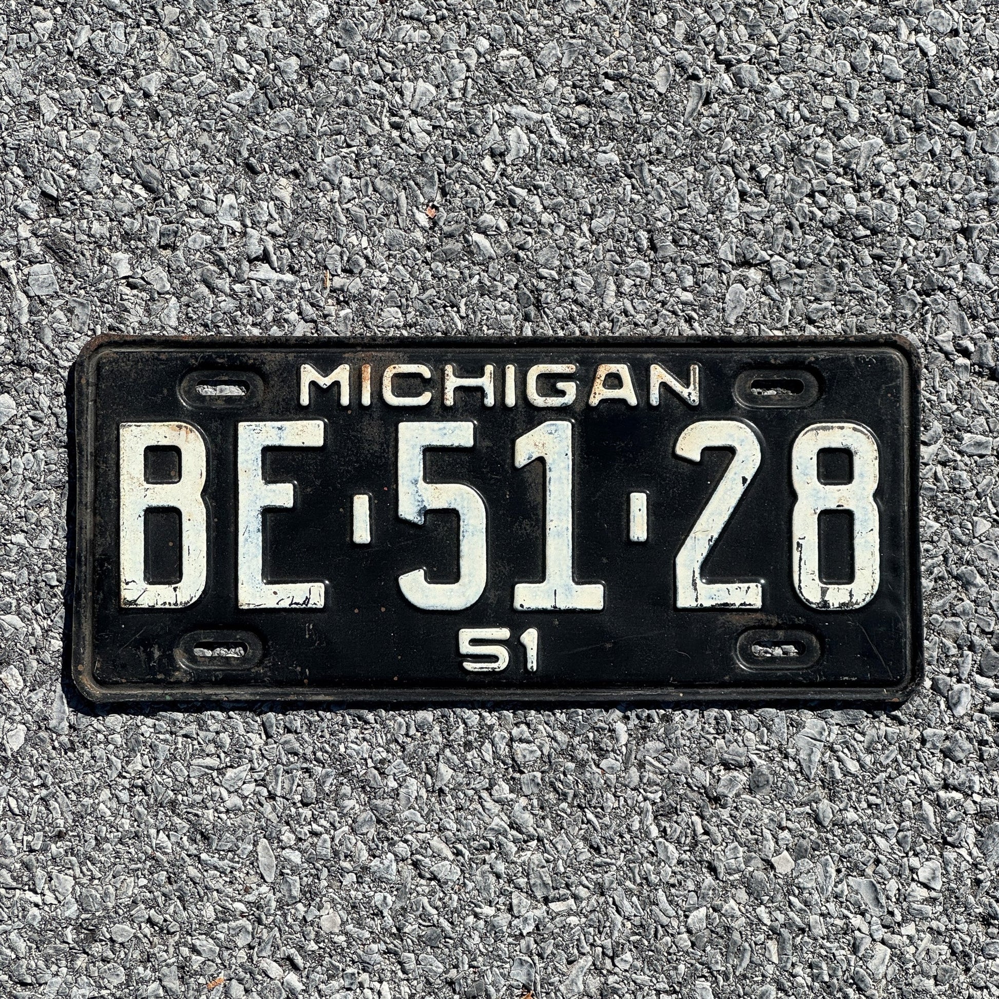 Photo of a 1951 Michigan License Plate Auto Tag Garage Decor Vintage BE 51 28