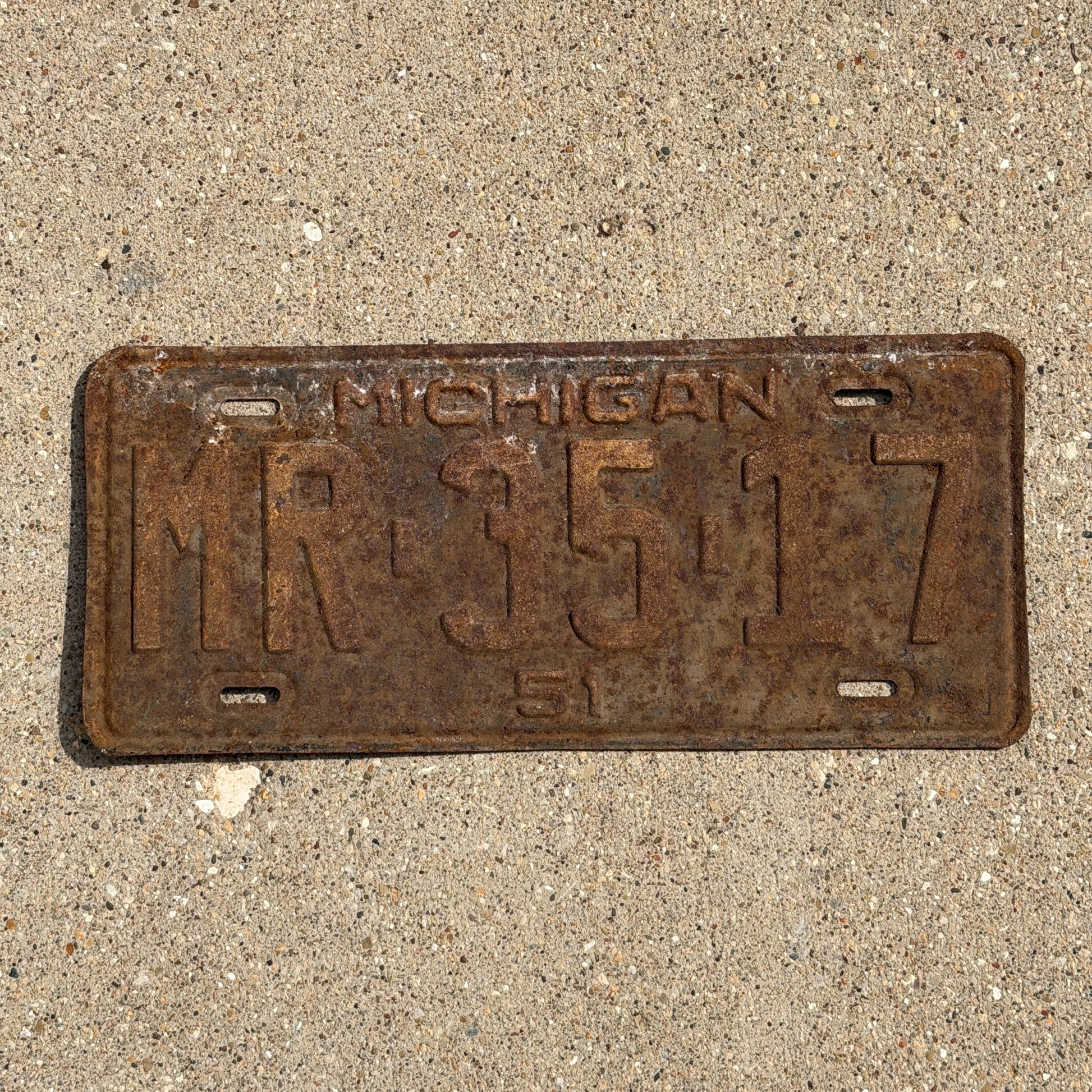 Photo of a 1951 Michigan License Plate Auto Tag Garage Decor Vintage MR 35 17 with original patina