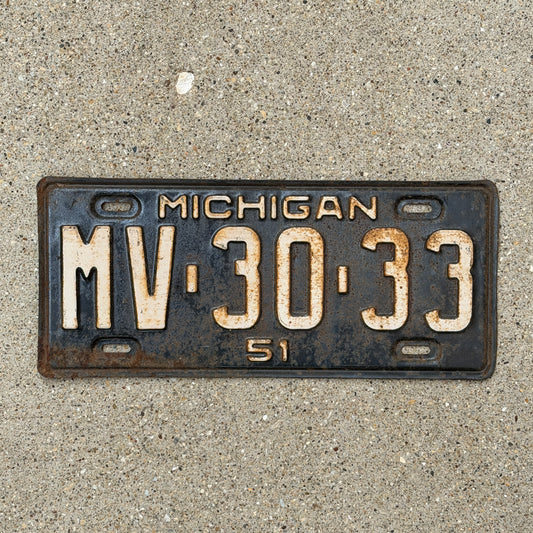 Photo of a 1951 Michigan License Plate Auto Tag Garage Decor Vintage MV 30 33 with original patina