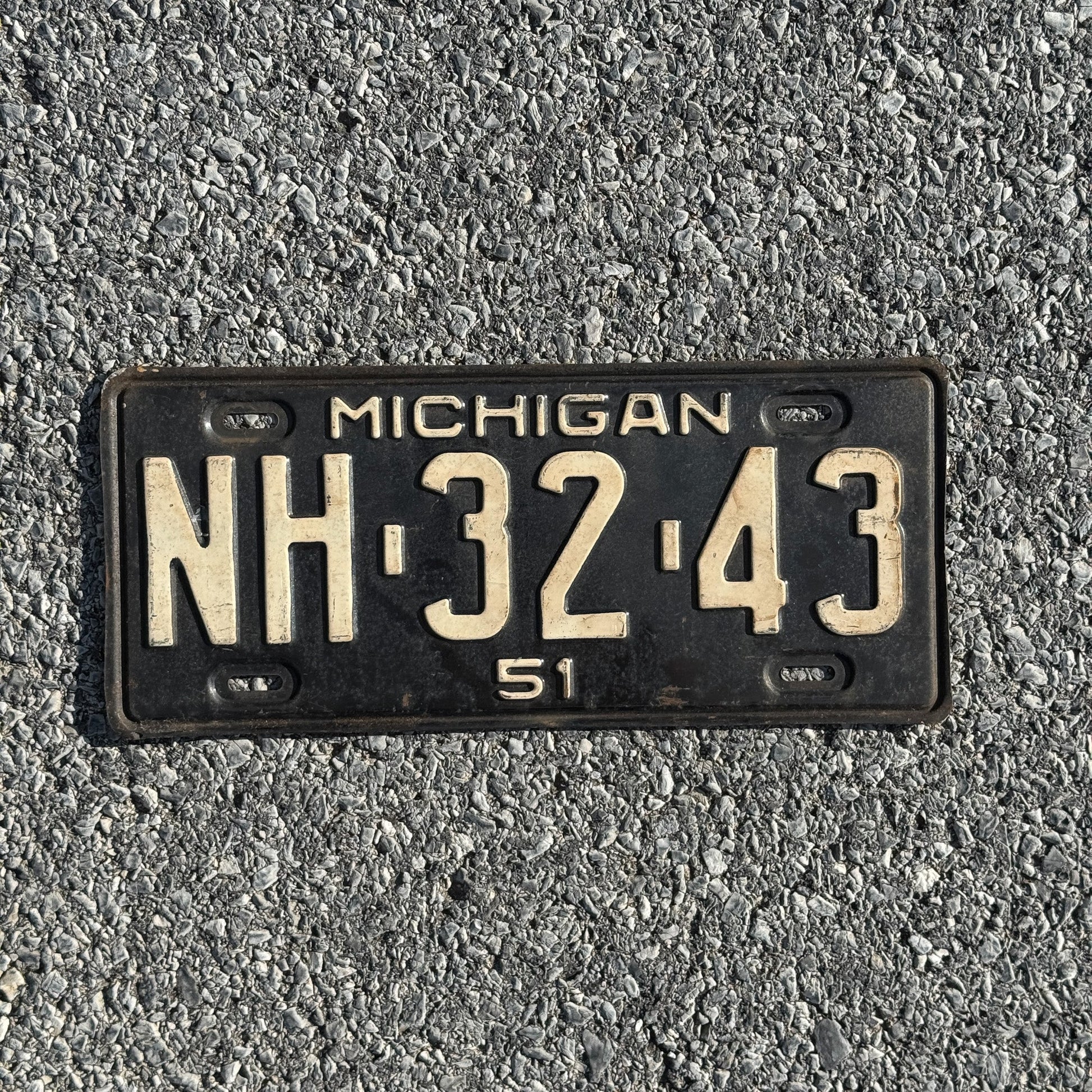 Photo of a 1951 Michigan License Plate Auto Tag Garage Decor Vintage NH 3243