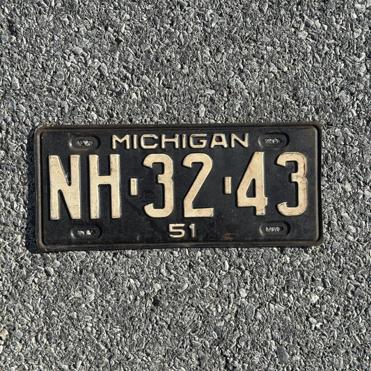 Photo of a 1951 Michigan License Plate Auto Tag Garage Decor Vintage NH 3243