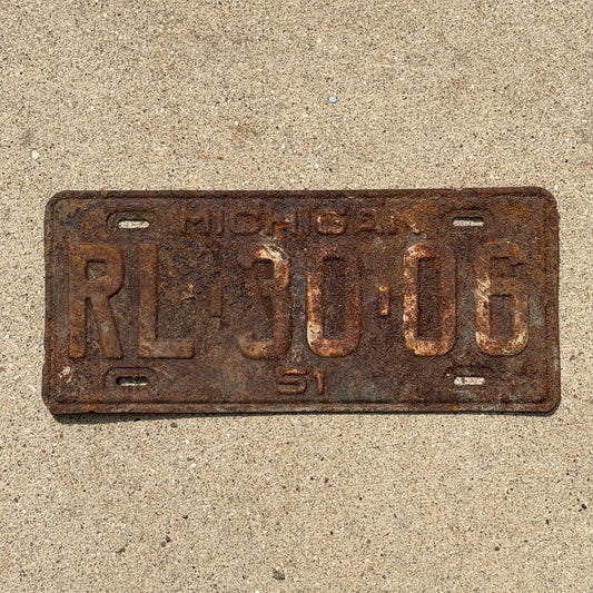Photo of a 1951 Michigan License Plate Auto Tag Garage Decor Vintage RL 30 06 with original patina