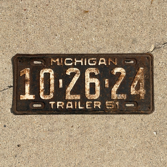Photo of a 1951 Michigan Trailer License Plate Auto Tag Garage Decor Vintage 10 26 24 with original patina