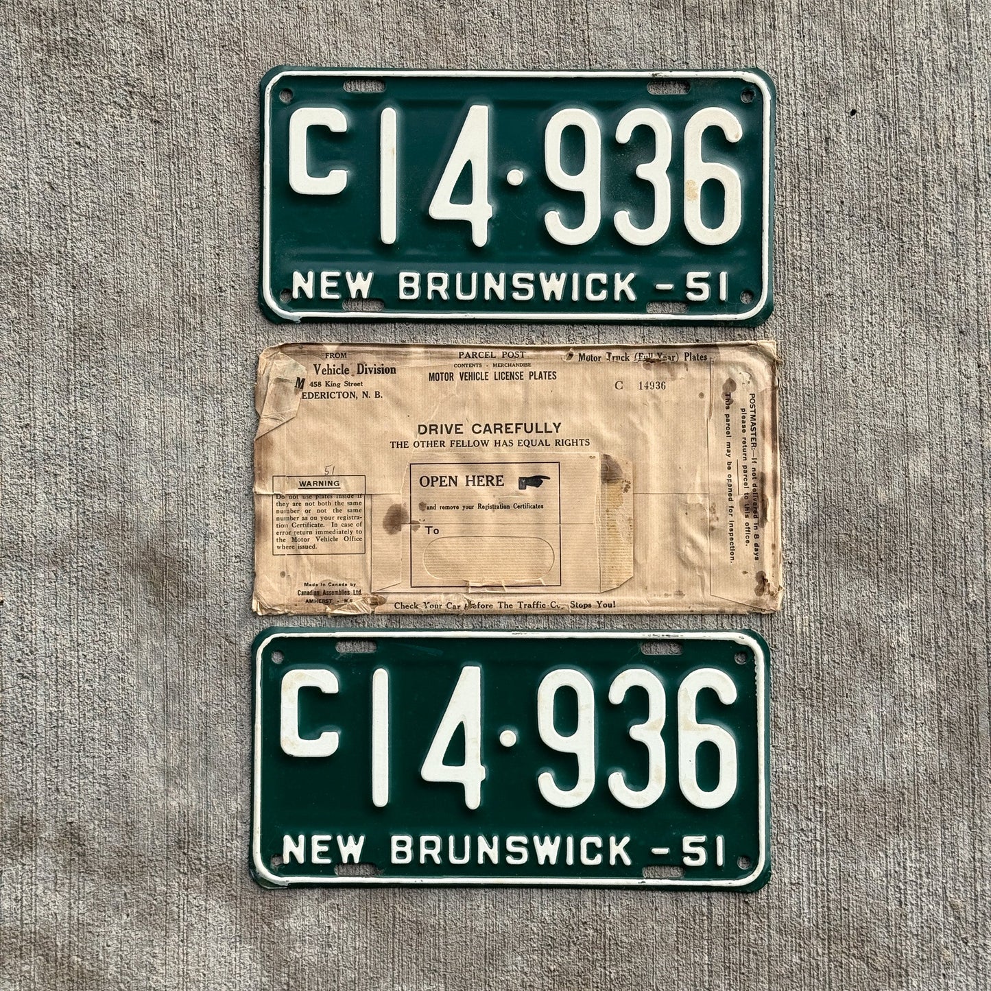 Photo of a 1951 New Brunswick Commercial License Plate Pair Auto Tag Garage Decor Vintage With Envelope Truck C 14 936 with original patina