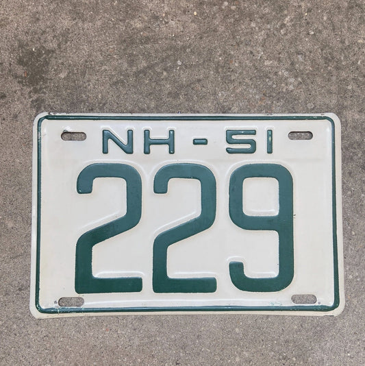 Photo of a 1951 New Hampshire License Plate Auto Tag Garage Decor Vintage Low Number Three Digit 229 with original patina