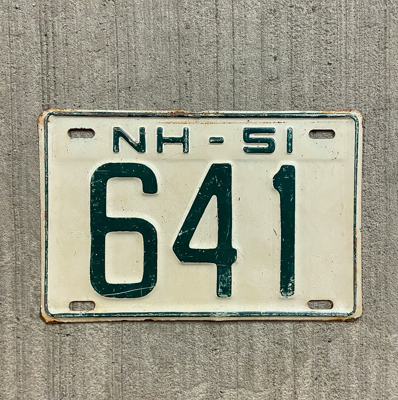 Photo of a 1951 New Hampshire License Plate Auto Tag Garage Decor Vintage Low Number Three Digit 641 with original patina