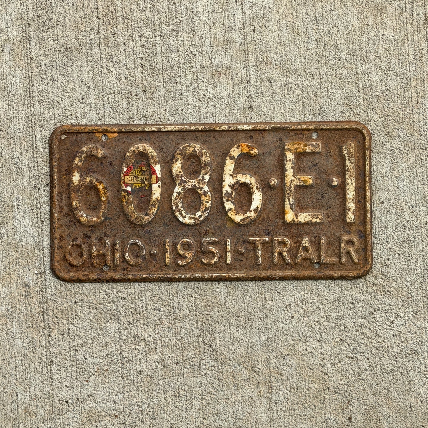 Photo of a 1951 Ohio Trailer License Plate Auto Tag Garage Decor Vintage 6086 E 1 with original patina