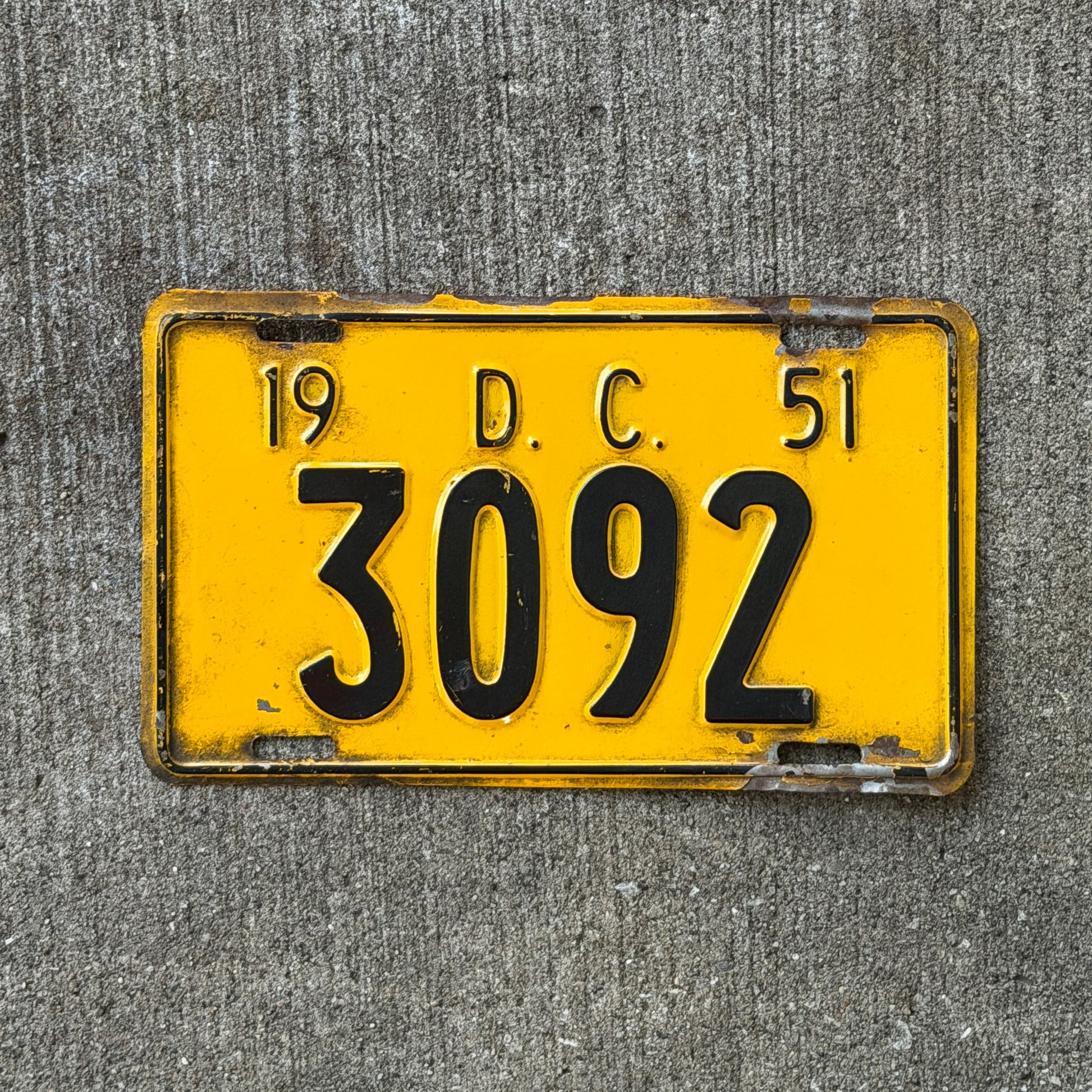 Photo of a 1951 Washington DC License Plate Auto Tag Garage Decor Vintage Low Number Four Digit 3092 with original patina