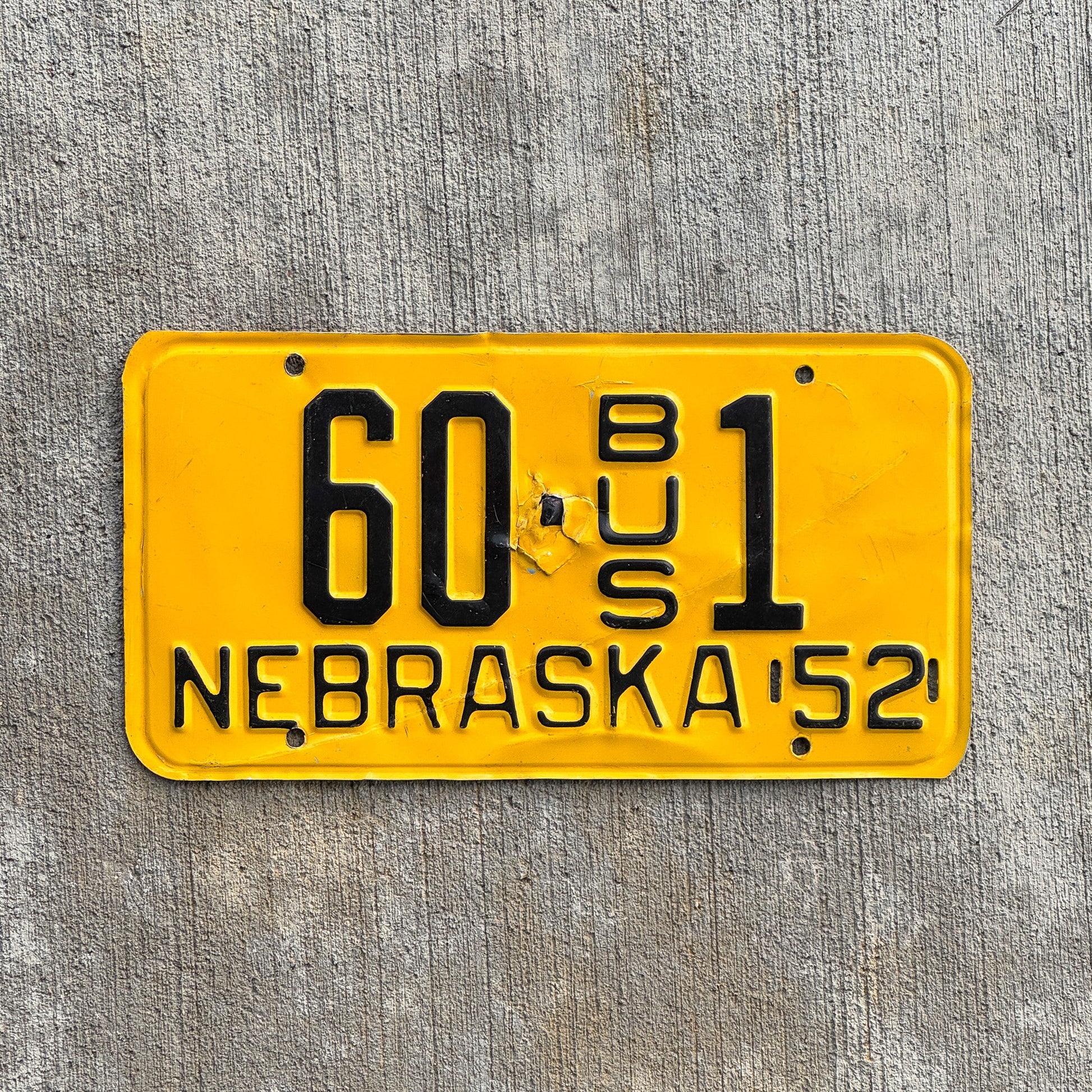 Photo of a 1952 1953 Nebraska County Bus License Plate Auto Tag Garage Decor Vintage ALPCA Archive Example Frontier County 60 1 with original patina