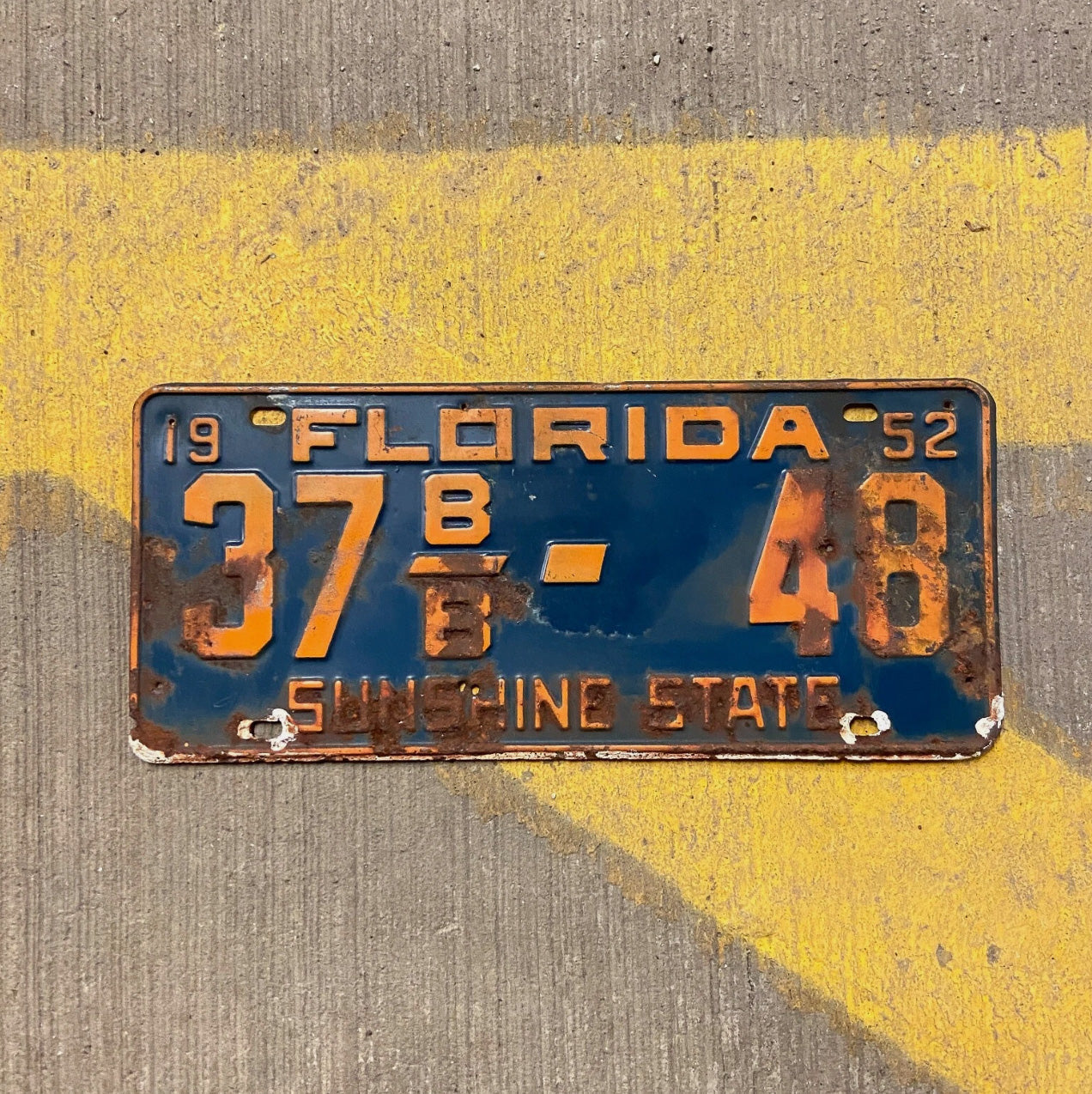 Photo of a 1952 Florida Trailer License Plate Auto Tag Garage Decor Vintage 37 B/B 48 with original patina
