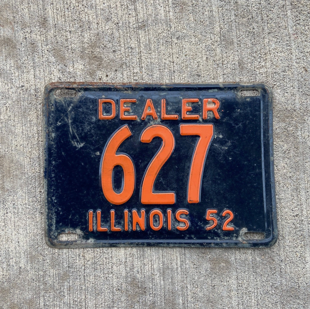 Photo of a 1952 Illinois Dealer License Plate Auto Tag Garage Decor Vintage Low Number Three Digit 627 with original patina