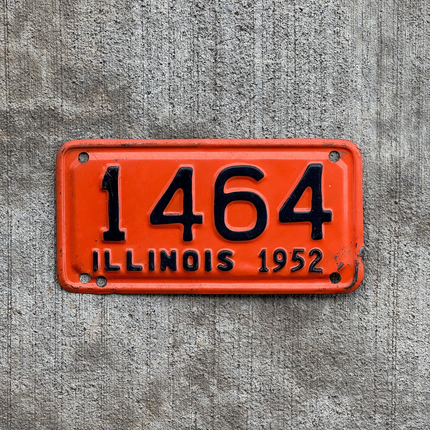 Photo of a 1952 Illinois Motorcycle License Plate Auto Tag Garage Decor Vintage Low Number Four Digit 1464 with original patina