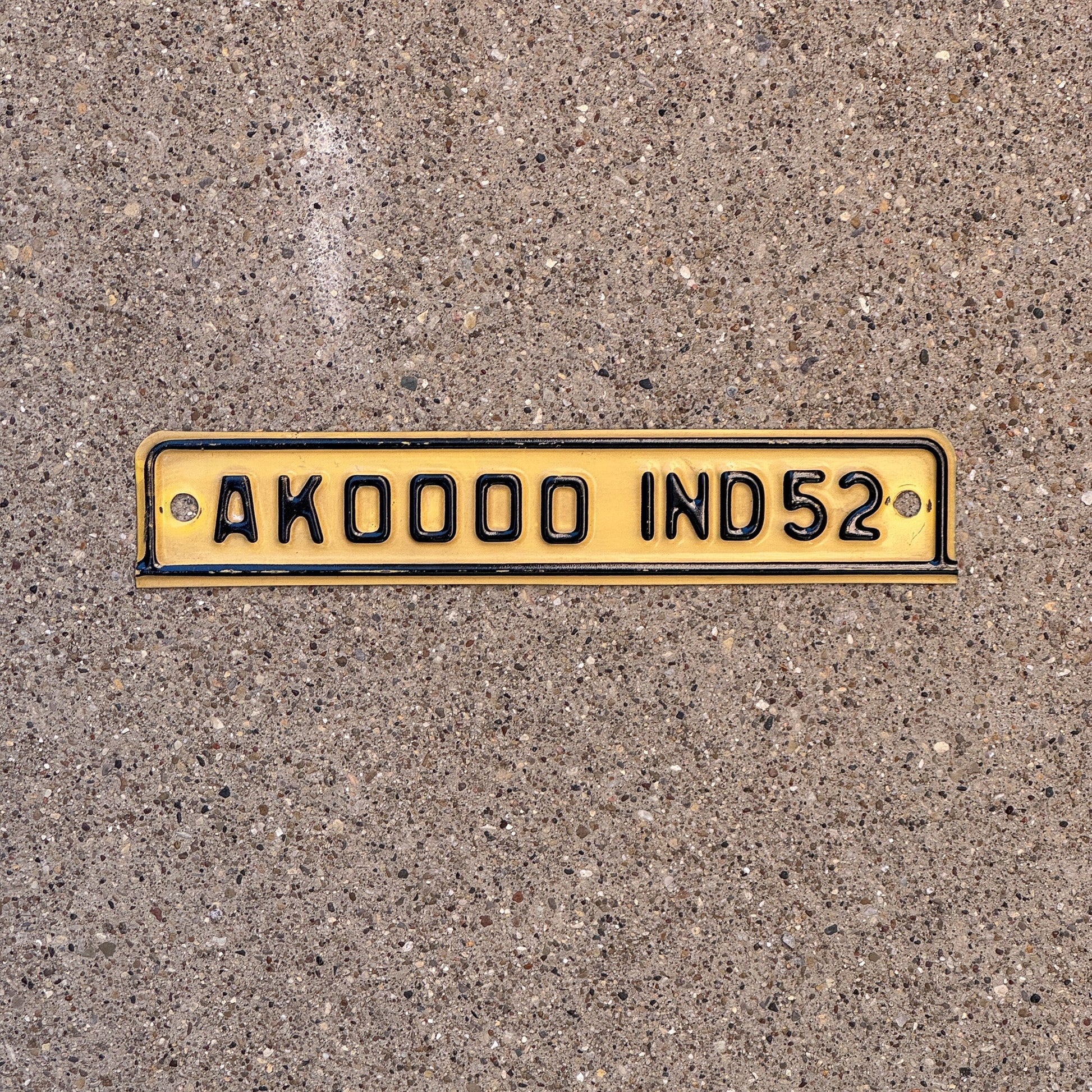 Photo of a 1952 Indiana Sample Tab License Plate Auto Tag 1 Garage Decor AK 0000 with original patina