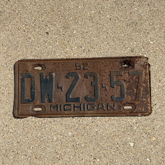 Photo of a 1952 Michigan License Plate Auto Tag Garage Decor Vintage DW 23 57 with original patina