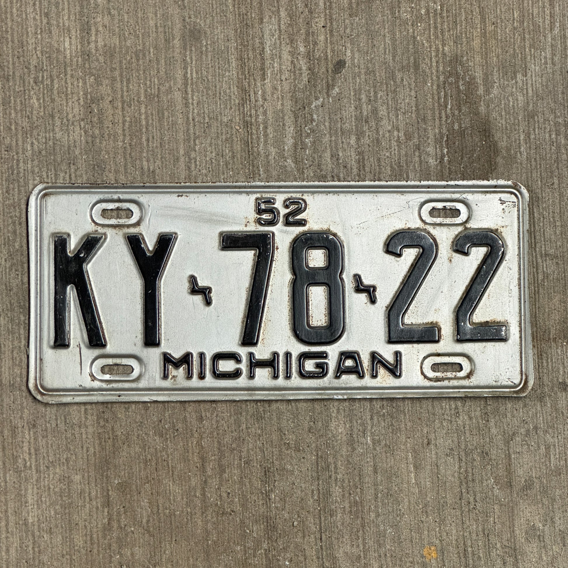 Photo of a 1952 Michigan License Plate Auto Tag Garage Decor Vintage KY 78 22 with original patina