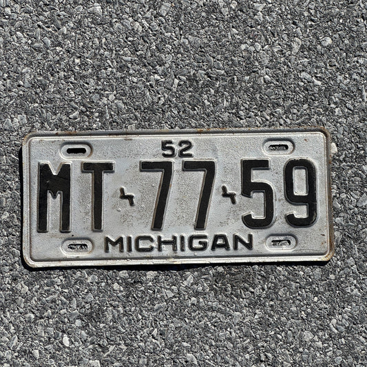 Photo of a 1952 Michigan License Plate Auto Tag Garage Decor Vintage MT7759