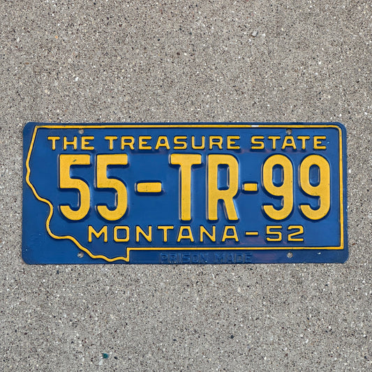 Photo of a 1952 Montana Trailer License Plate Auto Tag Garage Decor Vintage State Shape Petroleum County 55 TR 99 with original patina