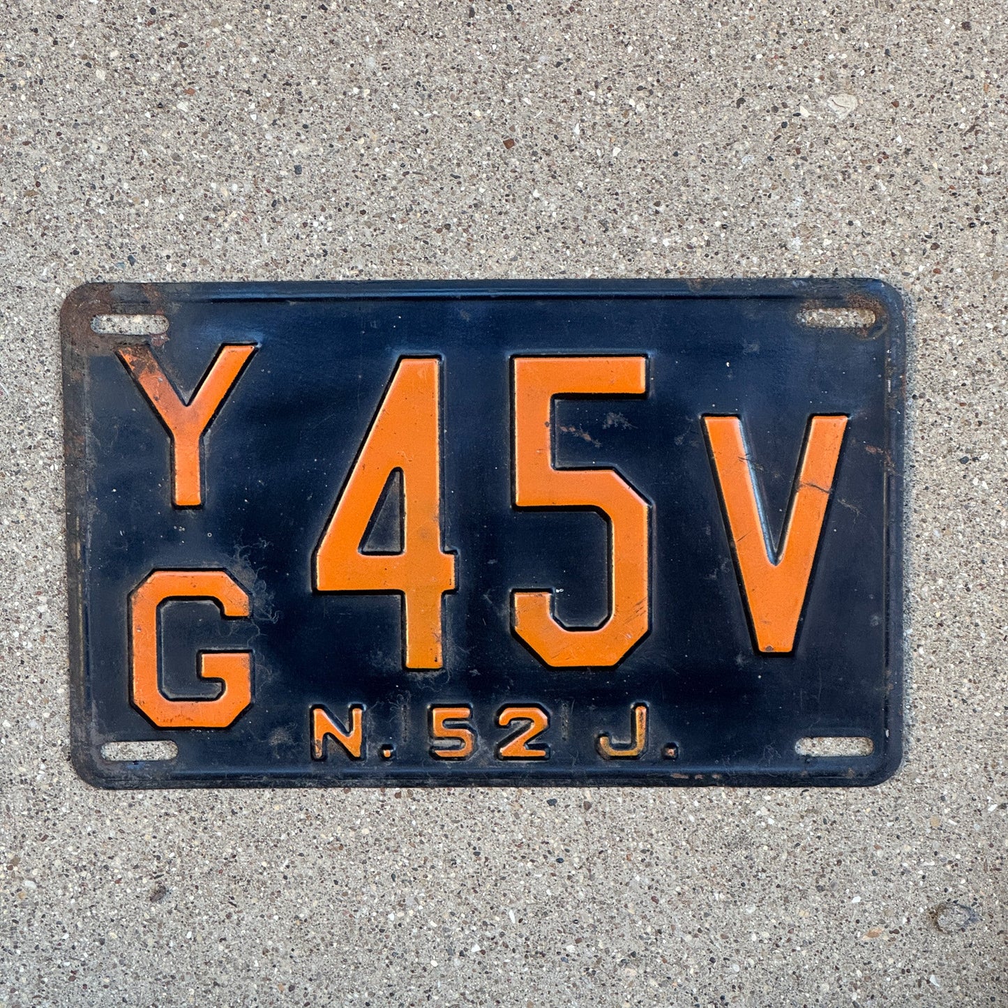Photo of a 1952 New Jersey License Plate Auto Tag Garage Decor Vintage YG 45 V with original patina