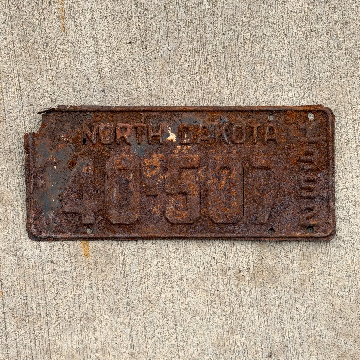 Photo of a 1952 North Dakota License Plate Auto Tag Garage Decor Vintage 40 507 with original patina