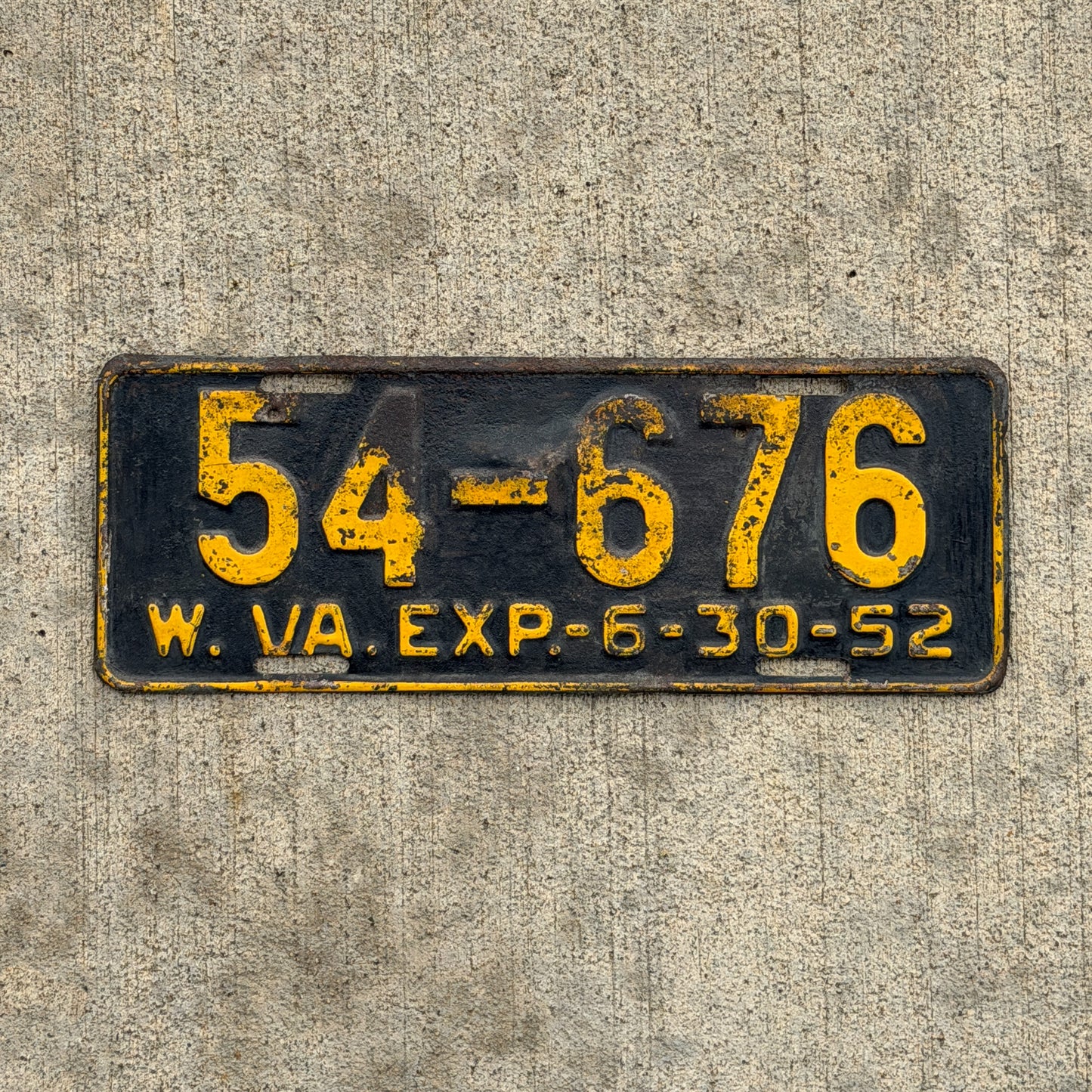 Photo of a 1952 West Virginia License Plate Auto Tag Garage Decor Vintage 54 676 with original patina