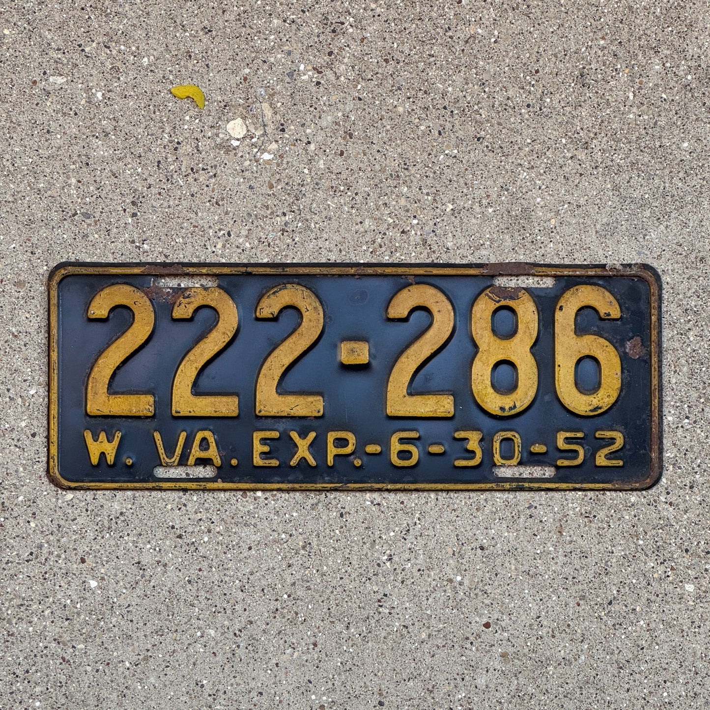 Photo of a 1952 West Virginia License Plate Auto Tag Garage Decor Vintage Repeat Repeating 222 286 with original patina