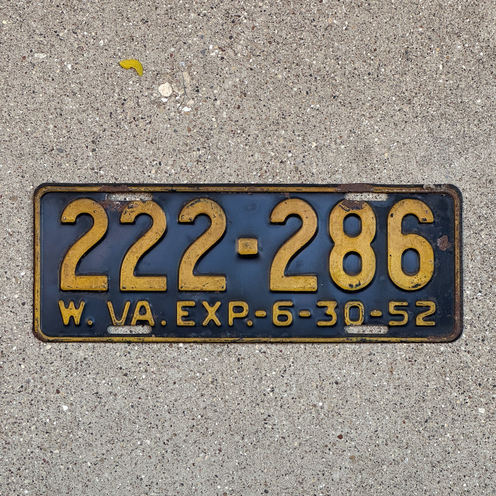 Photo of a 1952 West Virginia License Plate Auto Tag Garage Decor Vintage Repeat Repeating 222 286 with original patina