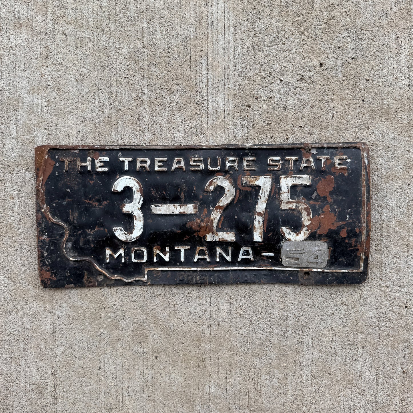 Photo of a 1953 1954 Montana License Plate Auto Tag Garage Decor Vintage State Shape Yellowstone County 3 275 with original patina