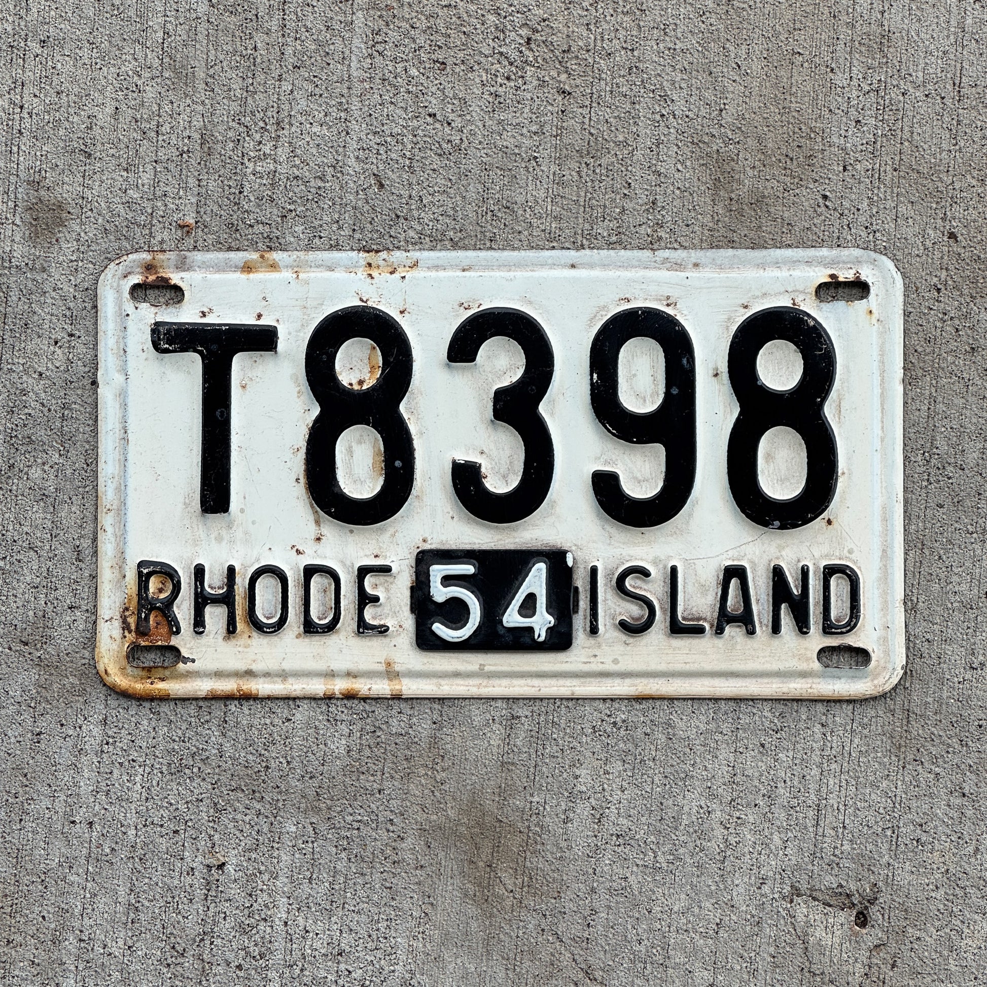 Photo of a 1953 1954 Rhode Island License Plate Auto Tag Garage Decor Vintage T 8398 with original patina