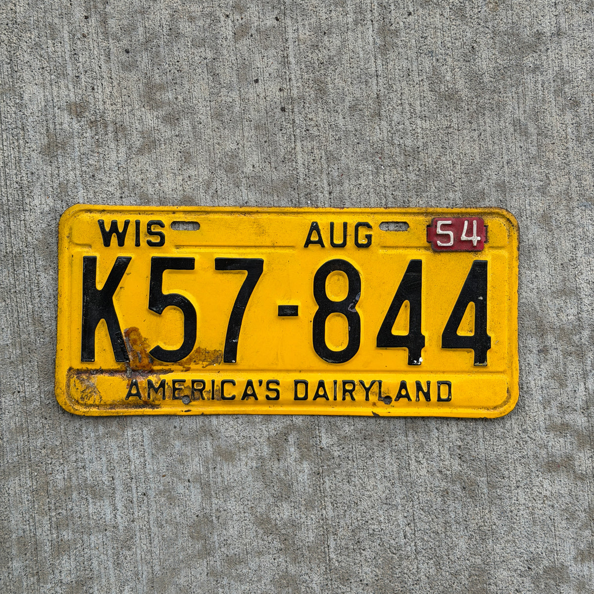 Photo of a 1953 1954 Wisconsin License Plate Auto Tag Garage Decor Vintage K57 844 with original patina