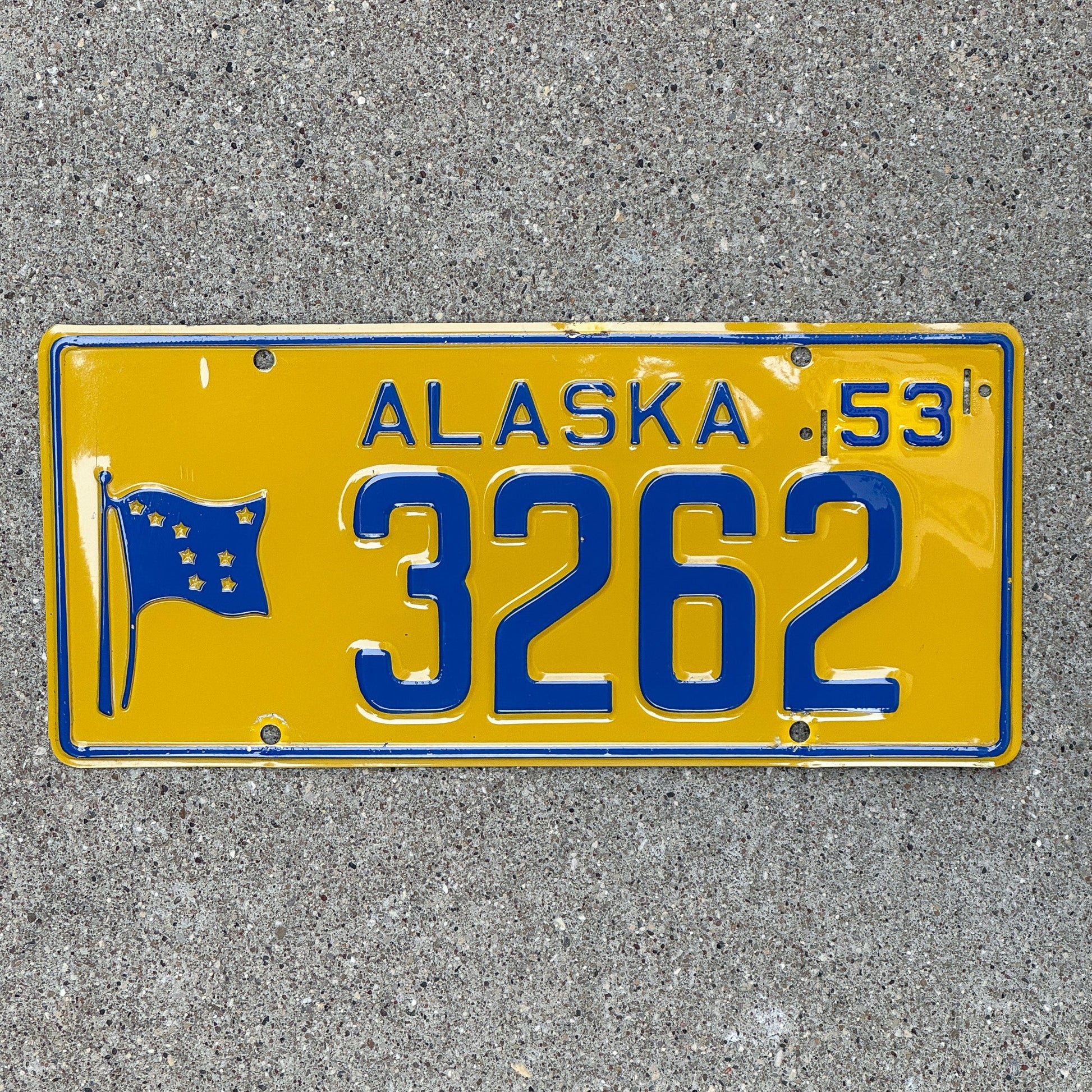 Photo of a 1953 Alaska License Plate Auto Tag Garage Decor Vintage Low Number Four Digit 3262 with original patina