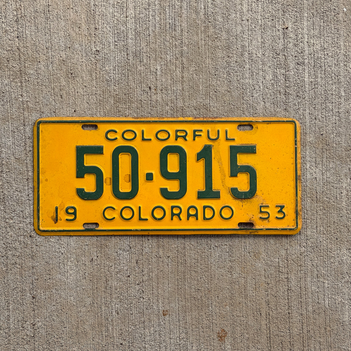 Photo of a 1953 Colorado License Plate Auto Tag Garage Decor Vintage 50 915 with original patina