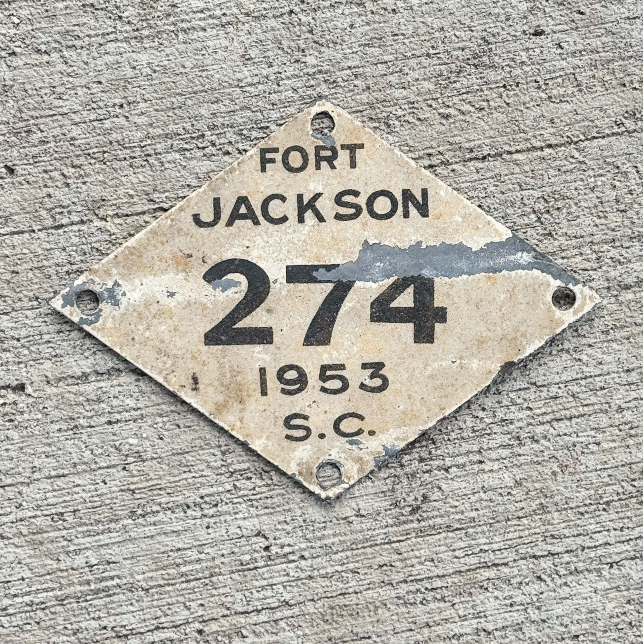 Photo of a 1953 Fort Jackson South Carolina License Plate Topper Auto Tag Garage Decor Vintage Military US Army Base 274 with original patina