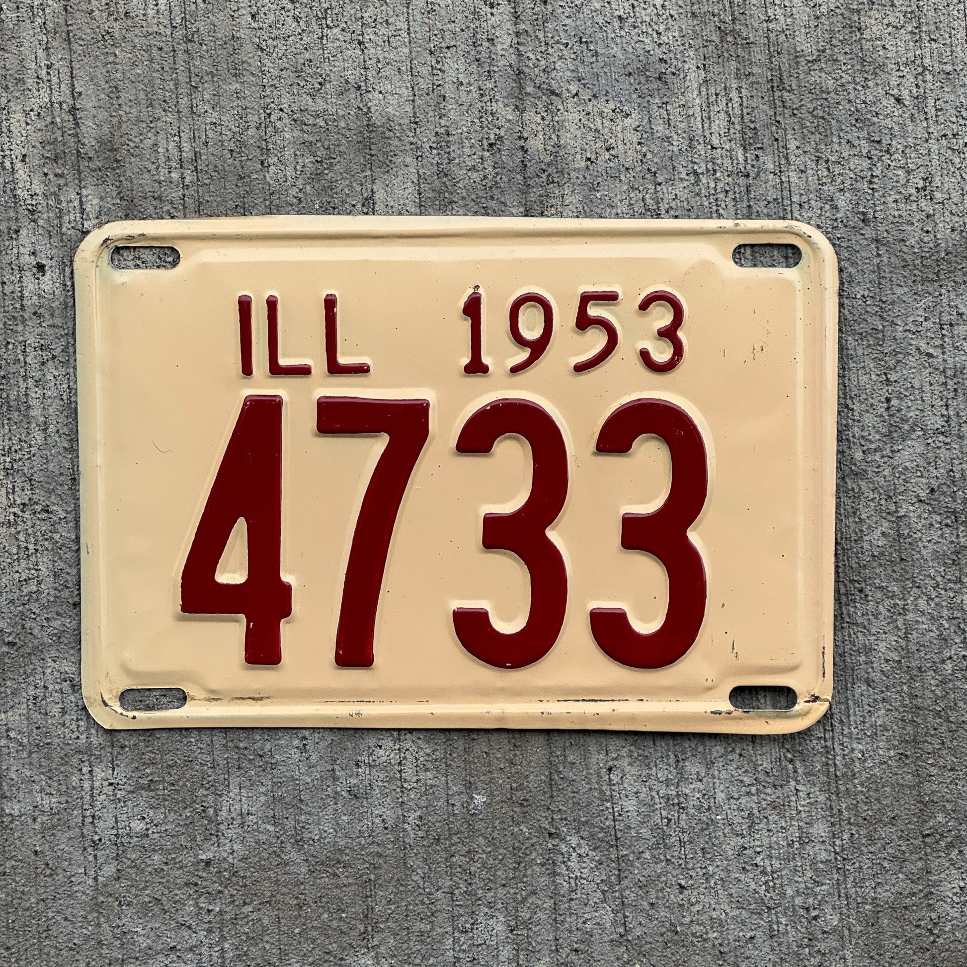 Photo of a 1953 Illinois License Plate Auto Tag Garage Decor Vintage Low Number Four Digit 4733 with original patina