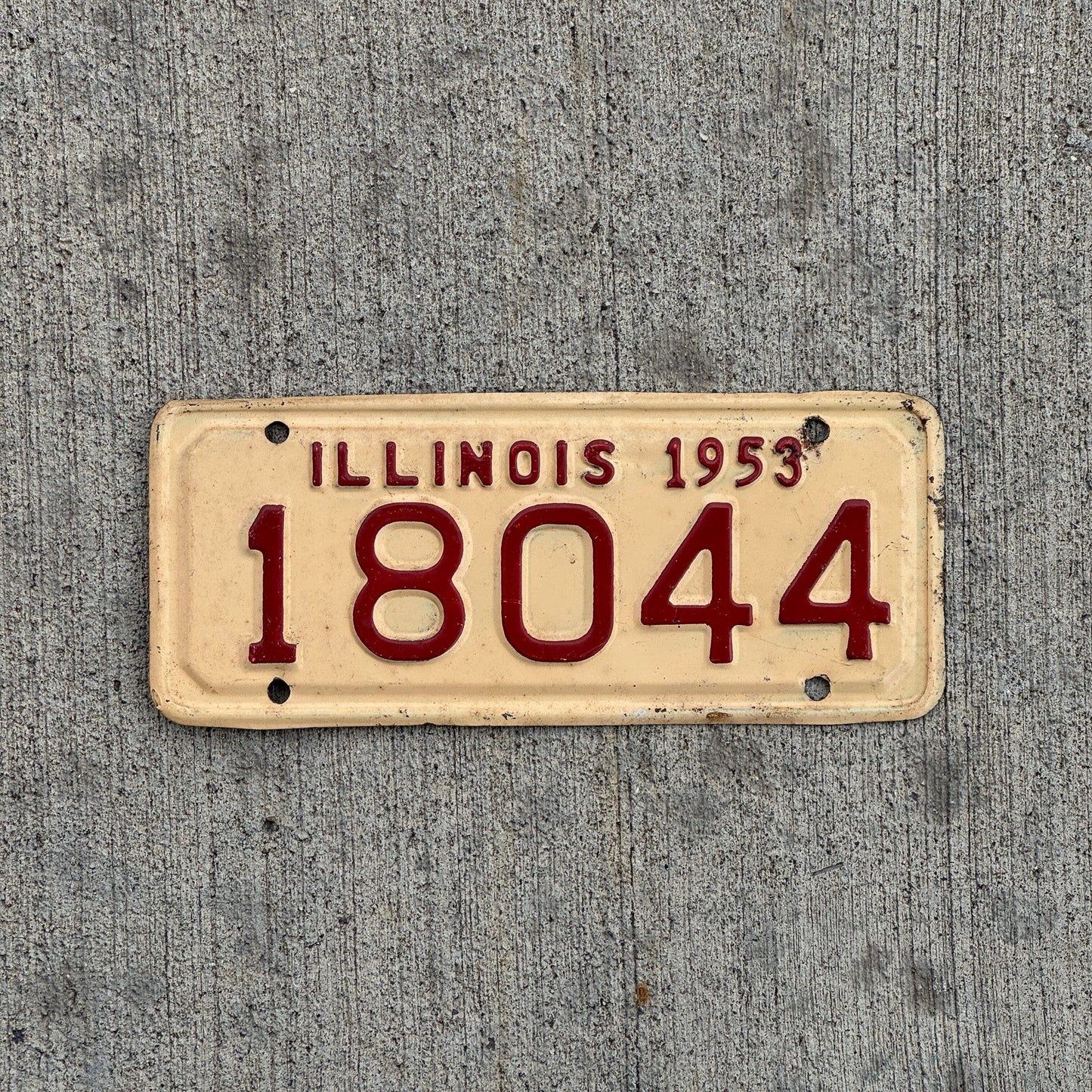 Photo of a 1953 Illinois Motorcycle License Plate Auto Tag Garage Decor Vintage 18044 with original patina
