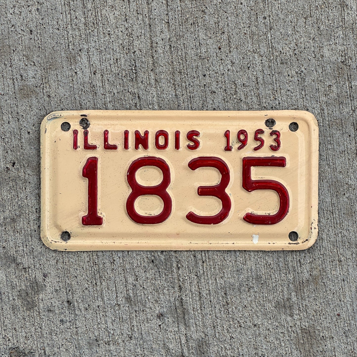 Photo of a 1953 Illinois Motorcycle License Plate Auto Tag Garage Decor Vintage Low Number Four Digit 1835 with original patina