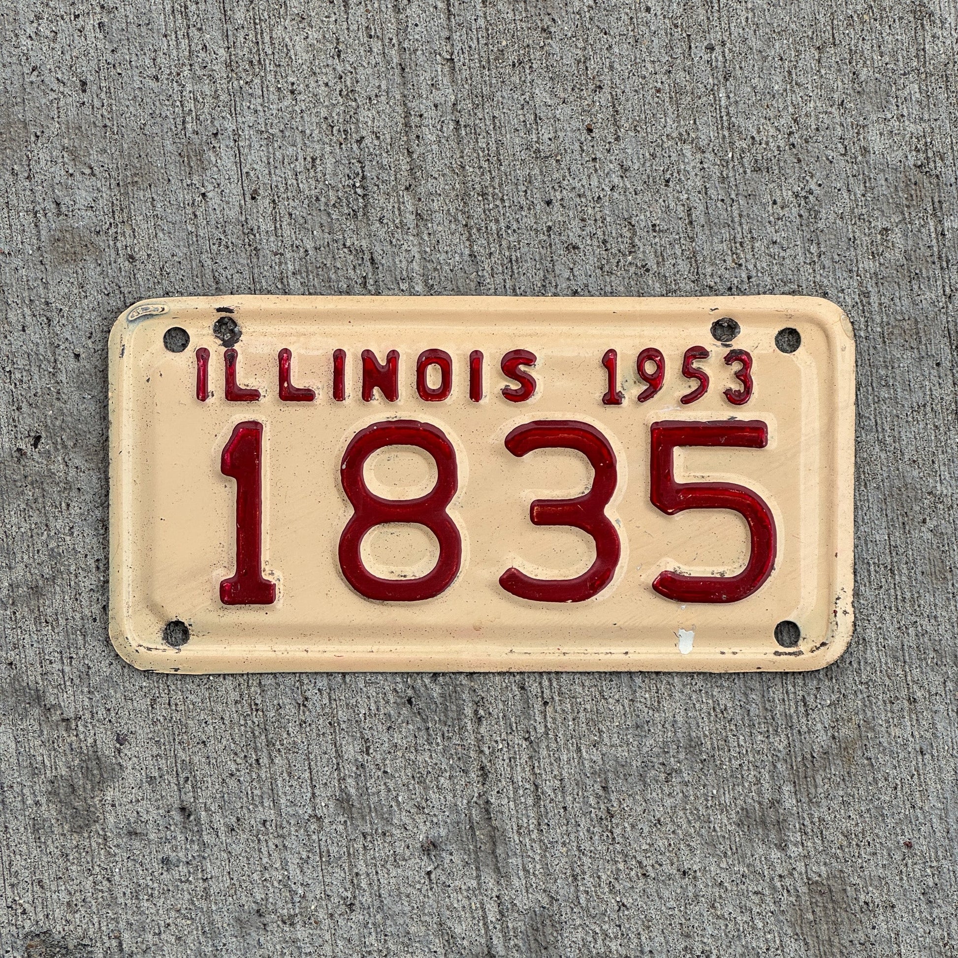 Photo of a 1953 Illinois Motorcycle License Plate Auto Tag Garage Decor Vintage Low Number Four Digit 1835 with original patina
