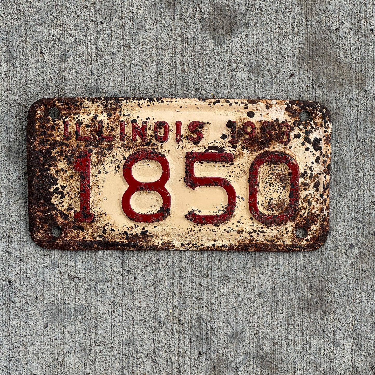 Photo of a 1953 Illinois Motorcycle License Plate Auto Tag Garage Decor Vintage Low Number Four Digit 1850 with original patina
