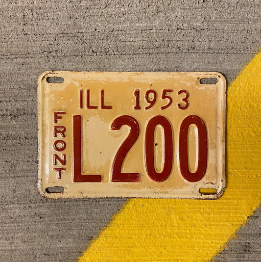 Photo of a 1953 Illinois Truck License Plate Auto Tag Garage Decor Vintage Low Number Three Digit L 200 with original patina