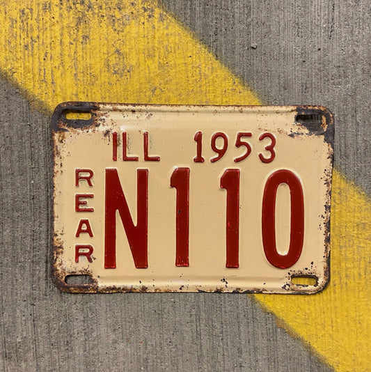 Photo of a 1953 Illinois Truck License Plate Auto Tag Garage Decor Vintage Low Number Three Digit N 110 with original patina
