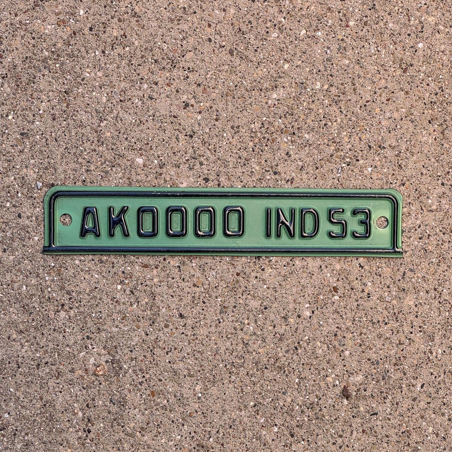 Photo of a 1953 Indiana Sample Tab License Plate Auto Tag Garage Decor Vintage AK 0000 with original patina