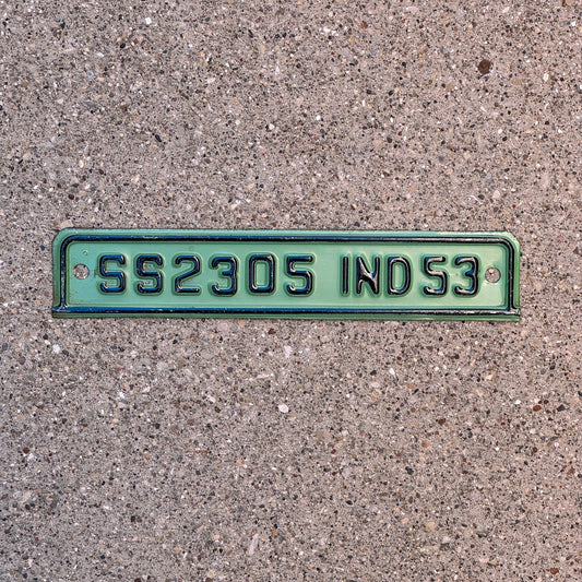 Photo of a 1953 Indiana Tab License Plate Auto Tag Garage Decor Vintage SS 2305 with original patina