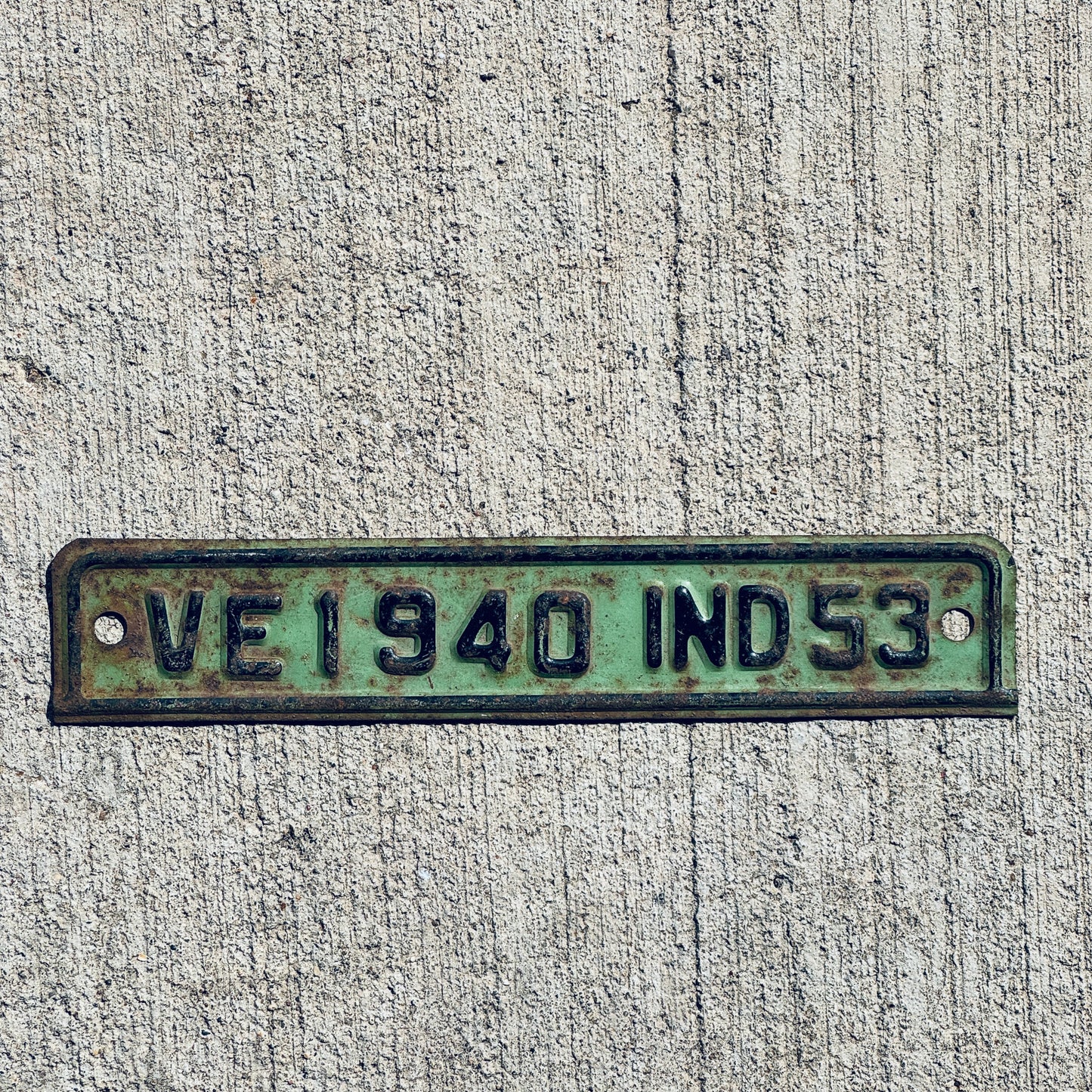 Photo of a 1953 Indiana Tab License Plate Auto Tag Garage Decor Vintage VE 1940 with original patina