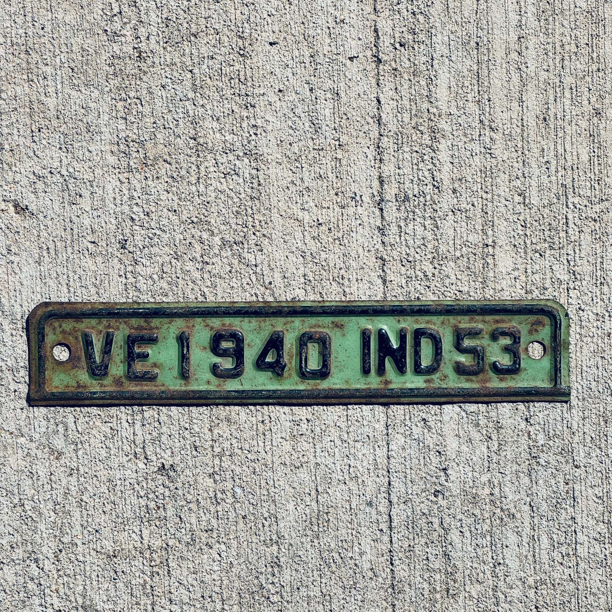 Photo of a 1953 Indiana Tab License Plate Auto Tag Garage Decor Vintage VE 1940 with original patina