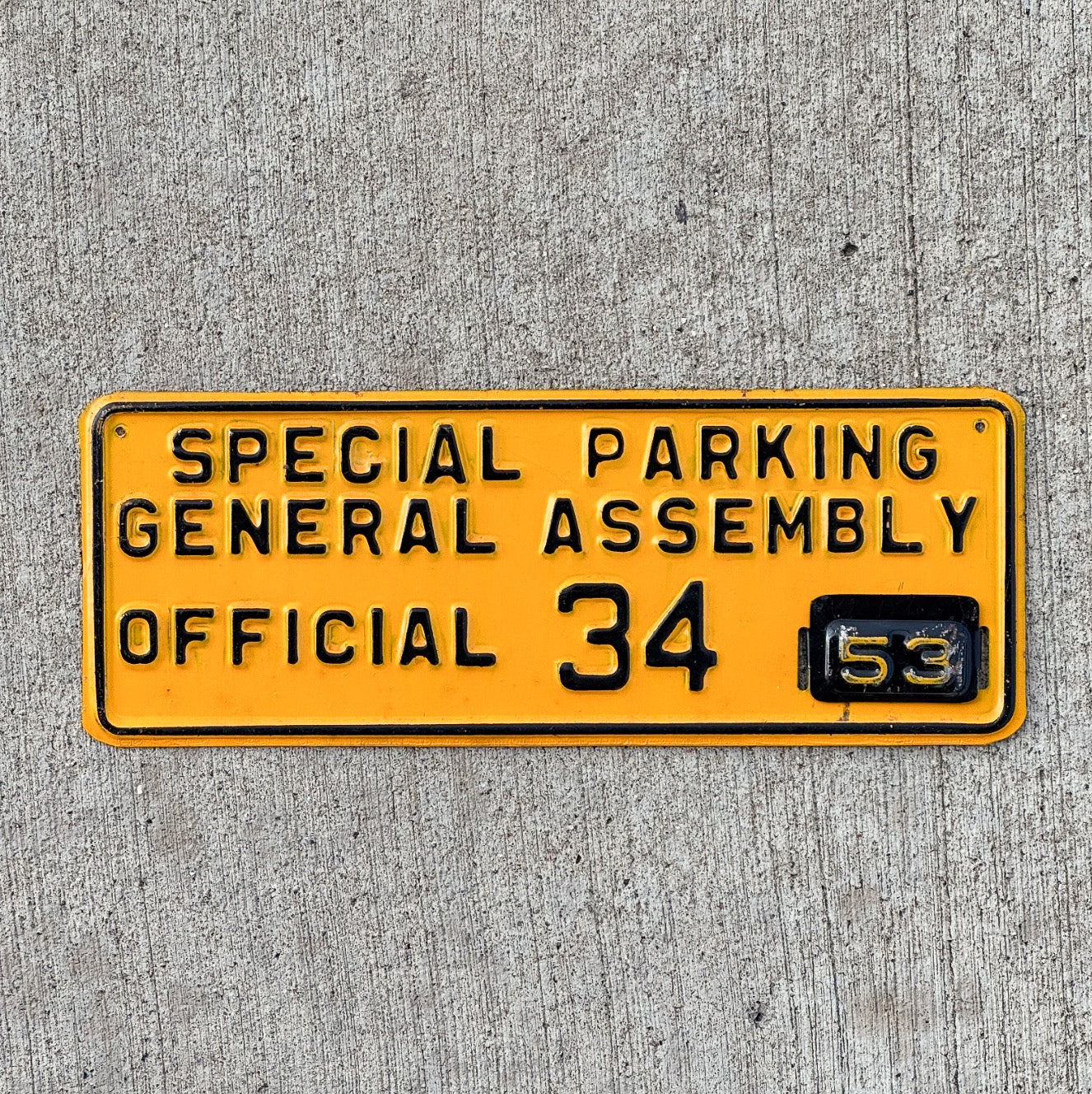 Photo of a 1953 Maryland General Assembly License Plate Topper Auto Tag Garage Decor Vintage Delegate Official 34 with original patina
