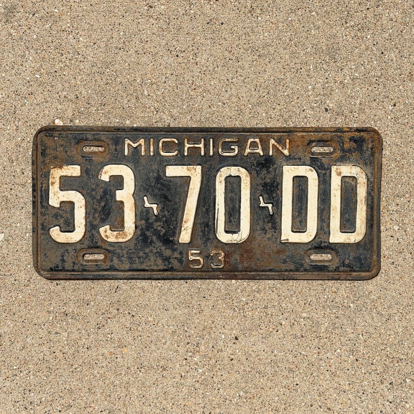 Photo of a 1953 Michigan Commercial License Plate Auto Tag Garage Decor Vintage 53 70 DD with original patina