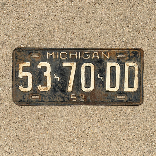 Photo of a 1953 Michigan Commercial License Plate Auto Tag Garage Decor Vintage 53 70 DD with original patina